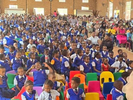 St Thomas College learners at a school assembly